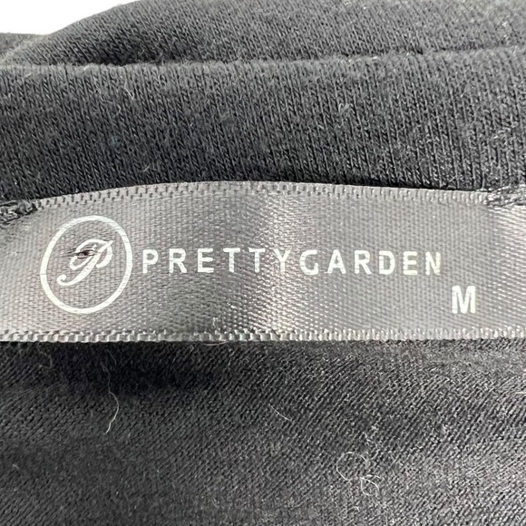 Elegant Black Sleeveless Jumpsuit - Picture 11 of 13